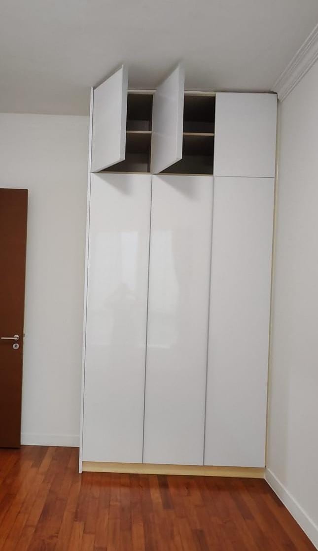 Refreshed white wardrobe after refurbishment service